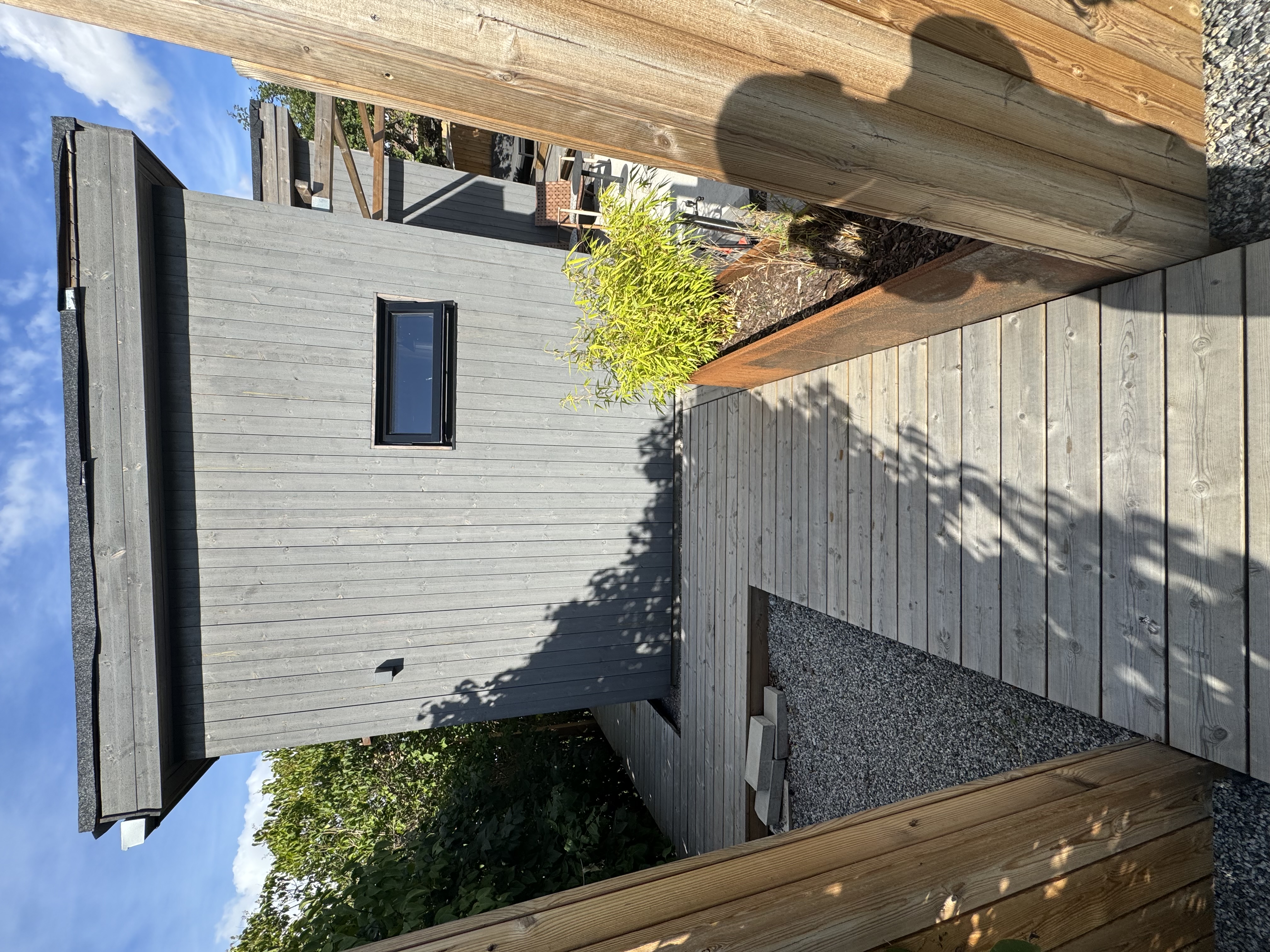 Timber home exterior in a natural setting